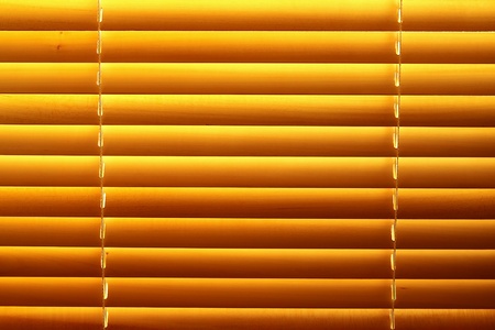 Horizontal yellow jalousie out of woodの写真素材