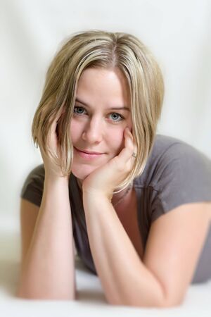 Close up view of a beautiful woman lyingの写真素材