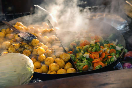 Grilling time  Grill, meat, potatoes and vegetables and a good moodの写真素材