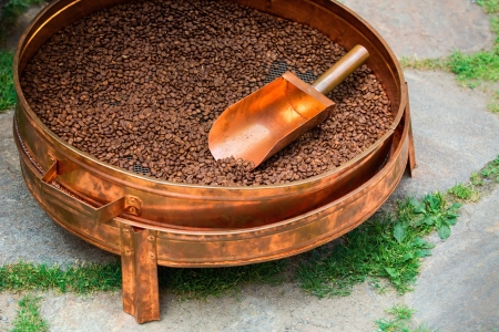 Copper vessel for roasting coffee with scoopの写真素材