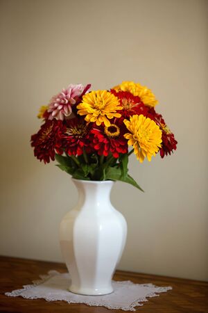 Beautiful gerbera flower bouquet on table の写真素材