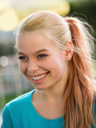Closeup portrait of attractive smiling little girl  Shallow DOFの写真素材