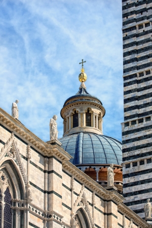 More detailed look on tower Siena Cathedral in Siena, Italyの写真素材