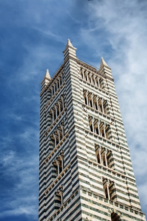 More detailed look on tower Siena Cathedral in Siena, Italyの写真素材