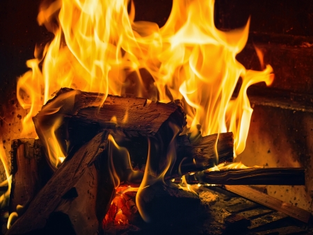  A small fire in the fireplace to smoke
の写真素材