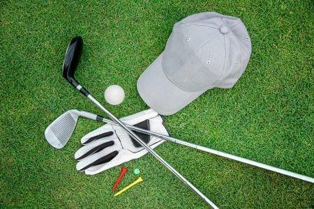 Golf equipment on green grassの写真素材