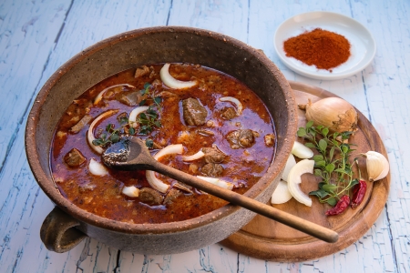 Beef stew in a pot and its main ingredientsの写真素材