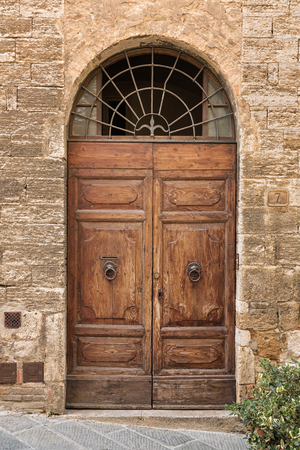Beautiful picturesque door of rural Tuscanyの写真素材