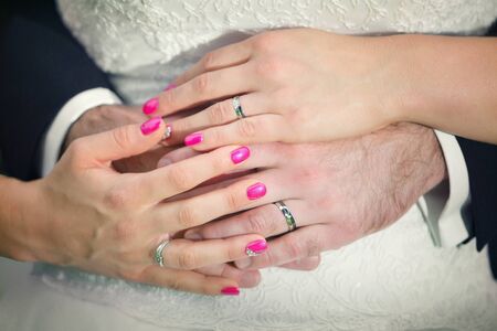 Close-up of a bride and groom in an embrace.の写真素材