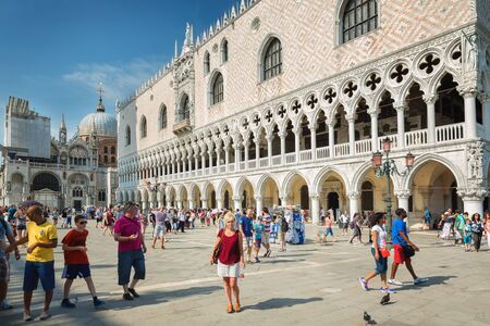 VENICE, ITALY - jul 5, 2014. St. Mark square in Venice.it is the principal public square of Venice, Italy, where it is generally known just as \\\"the Piazza\\\" with background Dogeのeditorial素材