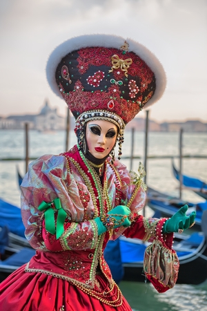Venice, Italy - February 27, 2014: Unidentified person with Venetian Carnival mask in Venice, Italy on February 2014. In 2014 the Venetian Carnival was held Between 4 and 15 February marchFor only editorialのeditorial素材