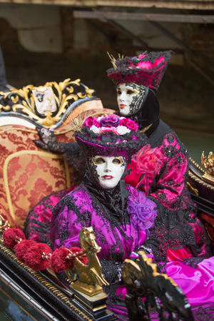 Venice, Italy - February 27, 2014: Unidentified person with Venetian Carnival mask in Venice, Italy on February 2014. In 2014 the Venetian Carnival was held Between February 15 and March 4のeditorial素材