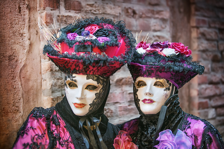 Venice, Italy - February 27, 2014: Unidentified person with Venetian Carnival mask in Venice, Italy on February 2014. In 2014 the Venetian Carnival was held Between February 15 and March 4のeditorial素材