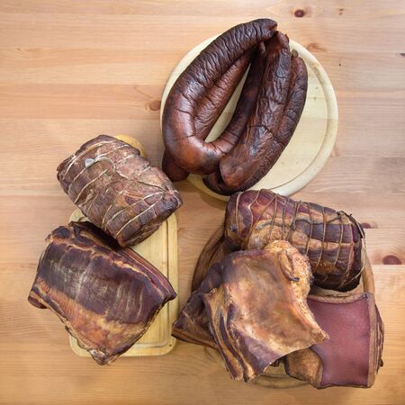 Fresh smoked ham, bacon, pork neck and sausagesの写真素材