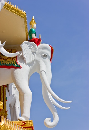 Statues of deities riding elephants in Thailand.の写真素材