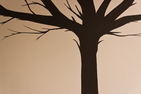 Drawing a tree on the wall.の写真素材