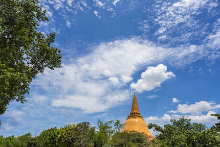 Big pagoda in forest on blue sky.の写真素材