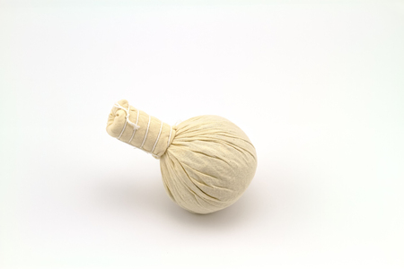 Spa herbal compressing ball on white backgroundの写真素材