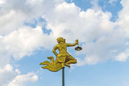 Hanging lantern  monkey in traditional Thai style Hanuman in the parkの写真素材