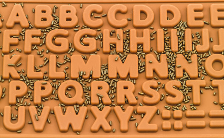 Many chocolate drops in English alphabet
