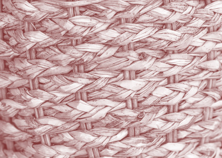 Zigzag interlocking of Egyptian payrus leaves use for background processed in red toneの写真素材