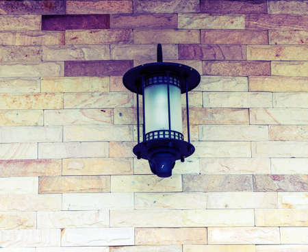Old lantern on the castle wallの写真素材