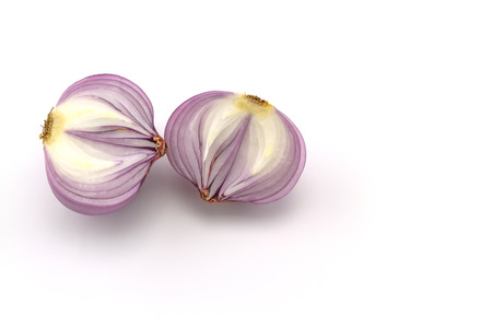 Red sliced onion isolated on white backgroundの写真素材