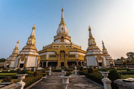 Silhouette of The Buddha Statue in Phra Maha Chedi Chai Mongkol Temple in Roi Et Thailand (...