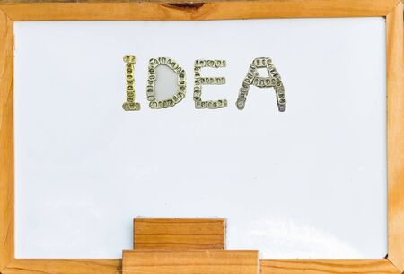 Whiteboard. Eraser and Blank Whiteboard mounted on wood frameの写真素材