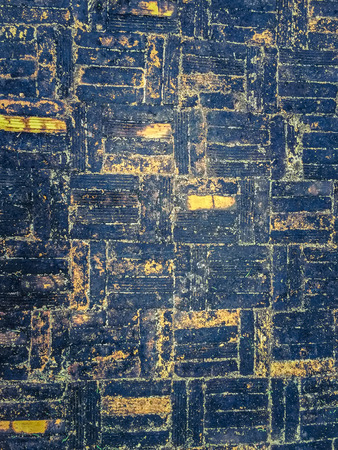 The brick texture with cracks and scratches can be used as a backgroundの写真素材