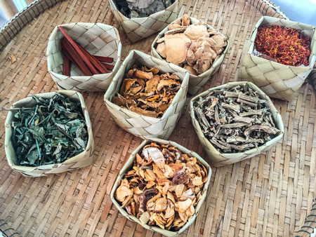 Aromatic spices in coconut weave and bamboo weave. (spices, herbs)の写真素材