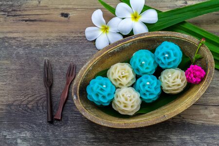 Traditional Thai dessert flower shape stuff with crush soybean and taro (Thai name kanom Chor phaka)...