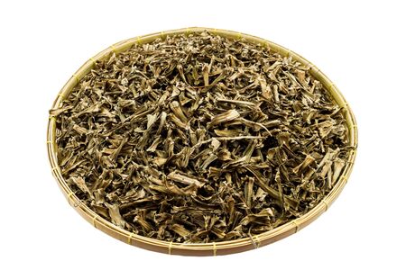 Dry Cissus quadrangularis in basket isolated on white.の写真素材
