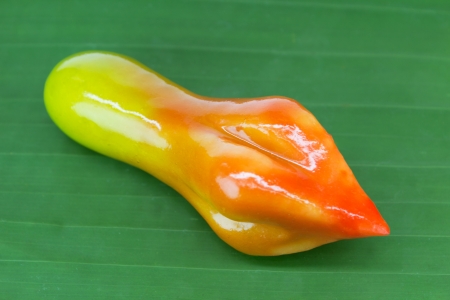 papaya  lookchoop thai dessert on banana leafの写真素材