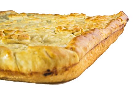 A large home-made cake on a white background の写真素材