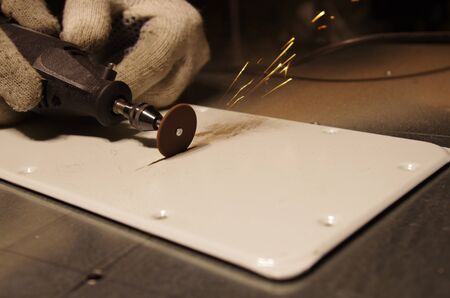 The process of cutting metal of small surface grinding of the cutting circleの写真素材