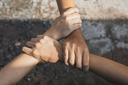 Man and woman join hands together, collaboration of business.  Unity and teamwork concept.の写真素材