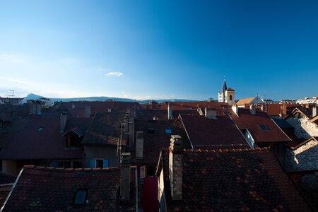 Traditional shingled roofs of historic downtown Annecy, France.の写真素材