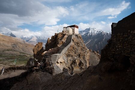A watchtower at the old monastery in Dhankar is set against a Himalayan backdrop.の写真素材