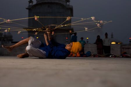 Paonta Sahib - May 22: A Sikh practices with a net-like weapon at the gurdwara known for its fierce past warriors May 22, 2009 at Paonta Sahib, Himachal Pradesh, Indiaのeditorial素材