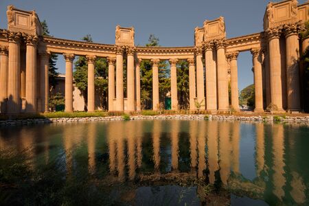 Columns of the Palace of Fine Arts is reflected in pond water in San Francisco, California.  Stylized post-processing.の写真素材