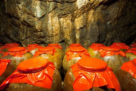Jars full of alcohol are stored in Tunnel 88, a former miitary shelter now used by a local distillery and has become a tourist attraction on Nangan Island of the Matsu archipelago in Taiwanの写真素材