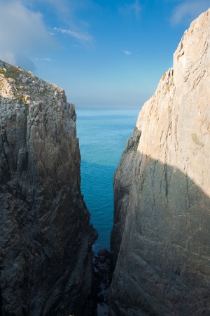 The steep and high walls of Suicide Cliff, a tourist attraction inspired by local legend on Dongyin Island on the Matsu archipelago of Taiwanの写真素材