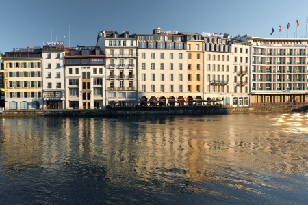 GENEVA, SWITZERLAND - JULY 20, 2010: Buildings of banks and financial companies occupy expensive real estate next to Lake Geneva July 20, 2010 in Geneva, Switzerland.  Geneva is one of the world's leading financial hubs.のeditorial素材