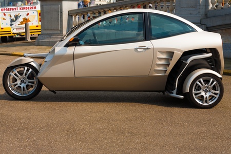 ANTWERP, BELGIUM - APRIL 14, 2010: A Carver One hybrid vehicle, a motorcycle like vehicle that can...