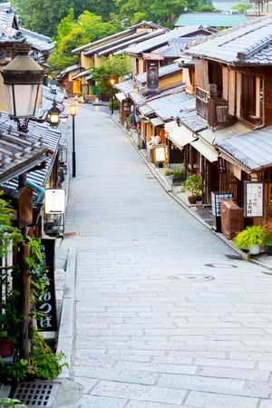 KYOTO, JAPAN - JUNE 15, 2015: Famous Kasagi-Ya sweets store on the empty road Sannen-Zaka full of tourist restaurants and shops in late eveningのeditorial素材