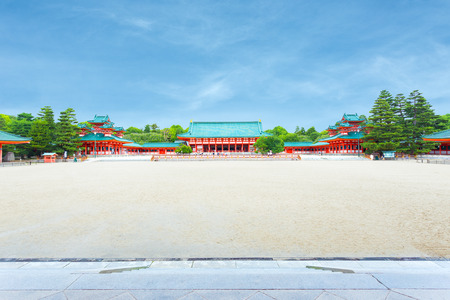 Wide inner courtyard with main Taikyokuden building centered of the Heian-Jingu shinto shrine on a clear, sunny, blue sky day in Kyoto, Japanのeditorial素材