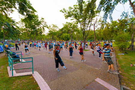 Bangkok, Thailand - April 8, 2007: Thai people performing group aerobics exercise in Lumpini Park, part of health initiative in the capitolのeditorial素材