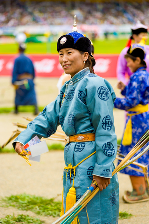 Ulaanbaatar, Mongolia - June 11, 2007: Female archery competitor in traditional garb participating in opening ceremony of the Naadam Festivalのeditorial素材