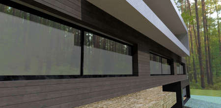 Exterior of a country house finished with a dark facade board. The dense dense forest is reflected in the mirrored windows. 3d rendering.の写真素材